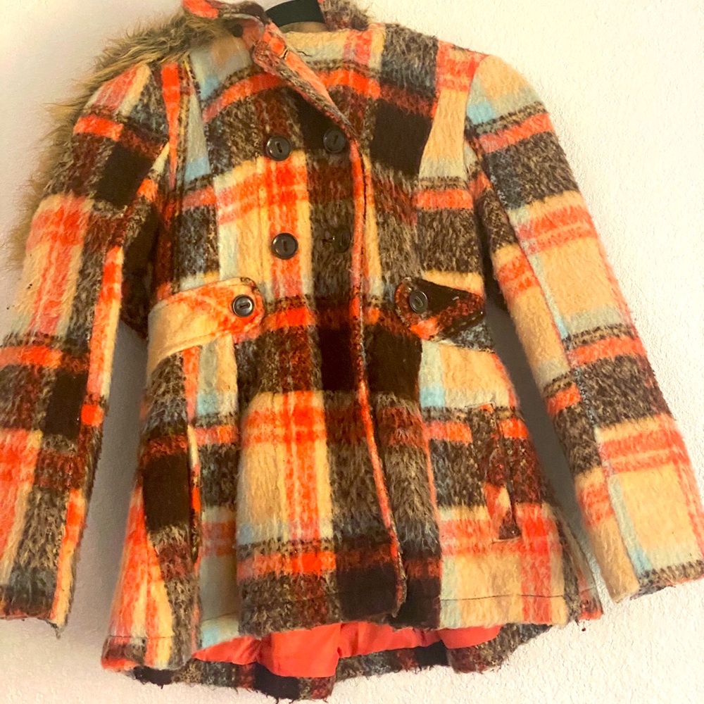 Stylish Hooded Children’s Coat that’s perfect for those cold days.
